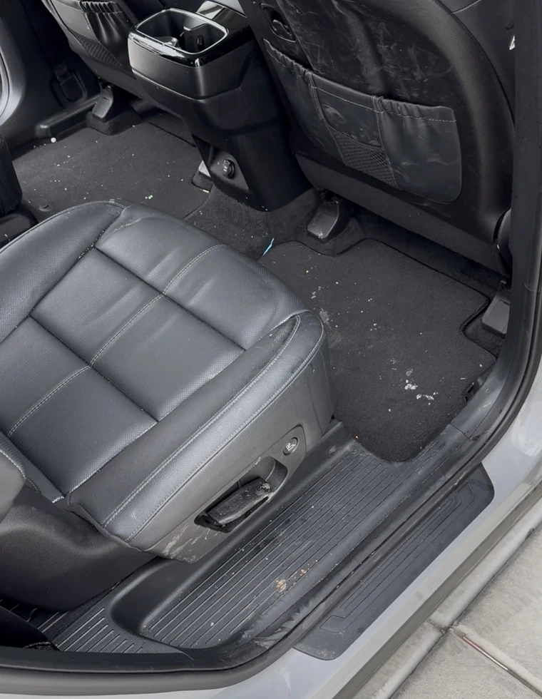 Vehicle interior before Echelon mobile detailing