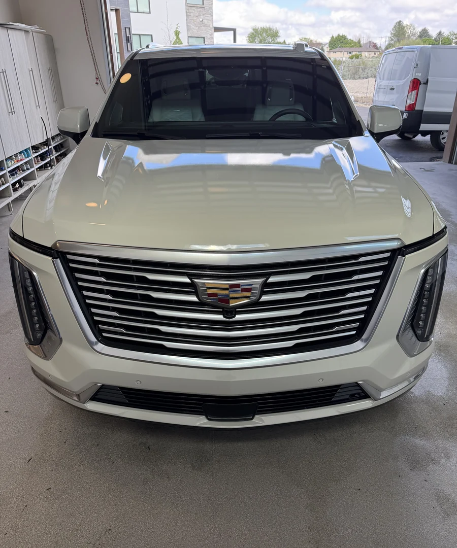 Finished white Cadillac Escalade after professional Echelon detailing